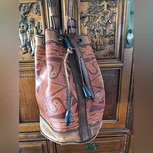 Vintage well loved Global style Leather bucket bag